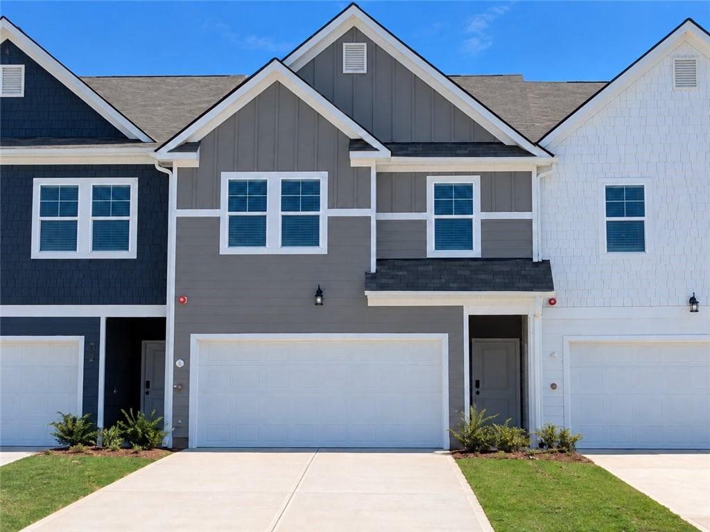Front exterior of a new home in Walden Park – The Collection, Jonesboro, GA, highlighting curb appeal (Image 1). Front exterior of a new home in Walden Park – The Collection, Jonesboro, GA, highlighting curb appeal (Image 1).