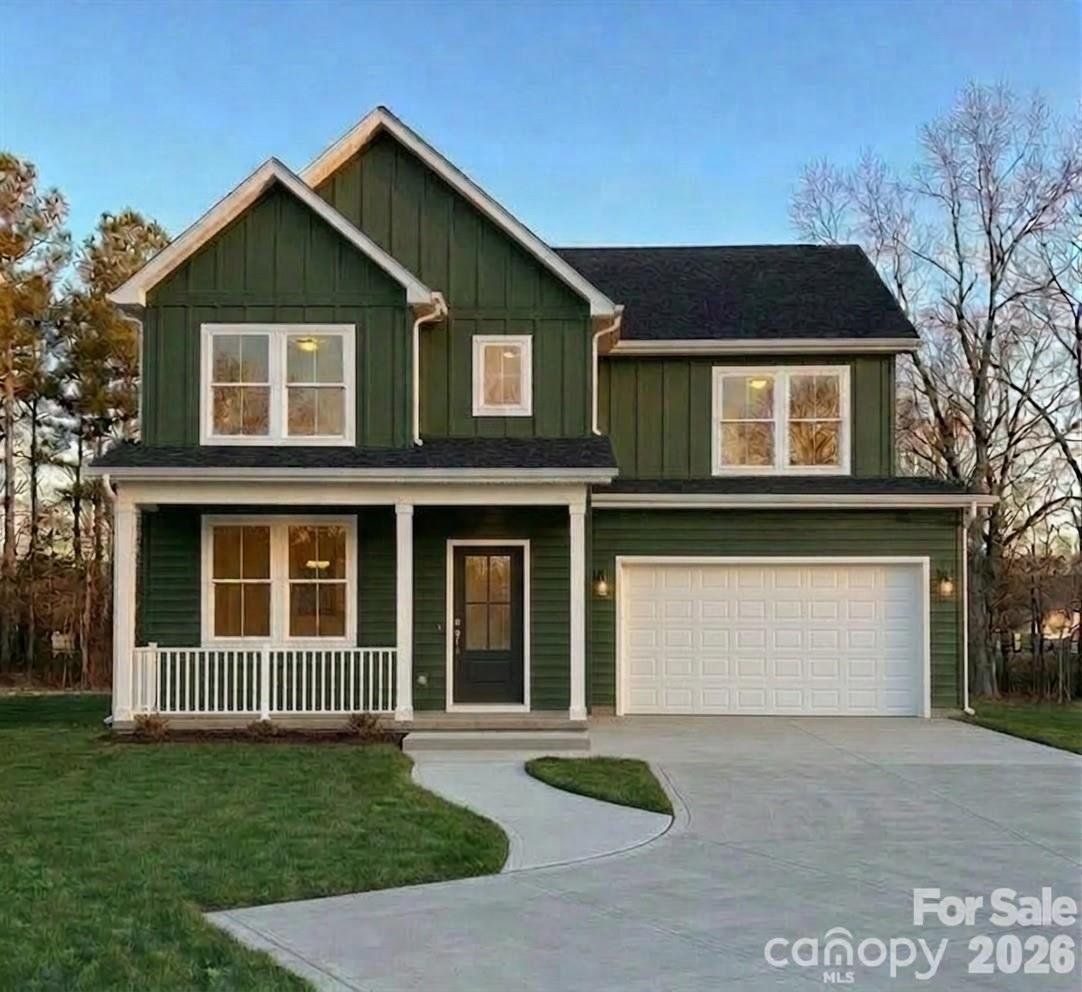 Front exterior of a new home in , Mooresville, NC, highlighting curb appeal (Image 1). Front exterior of a new home in , Mooresville, NC, highlighting curb appeal (Image 1).