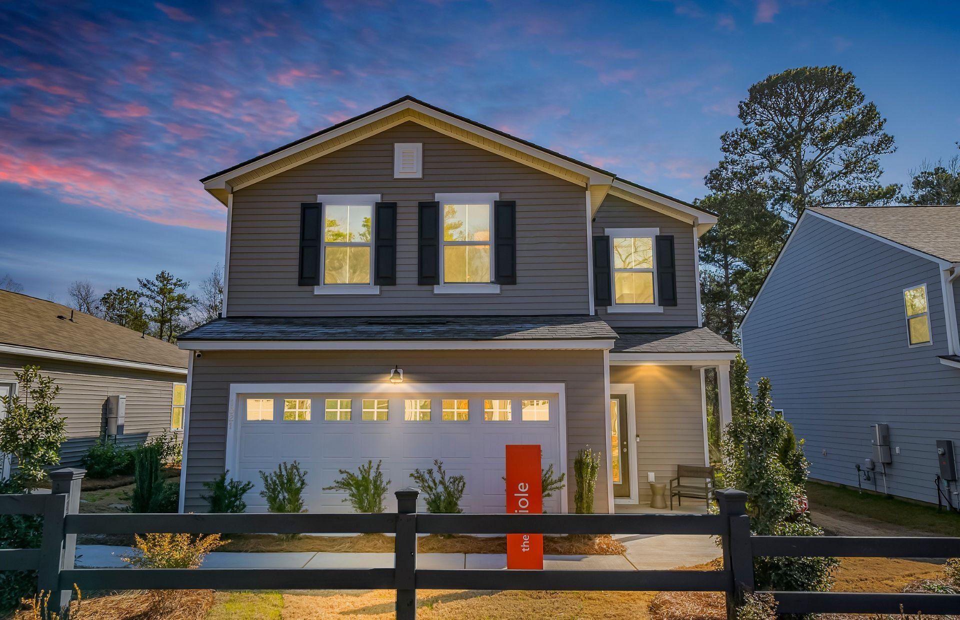 Front exterior of a new home in Grand Arbor, Blythewood, SC, highlighting curb appeal (Image 1). Front exterior of a new home in Grand Arbor, Blythewood, SC, highlighting curb appeal (Image 1).