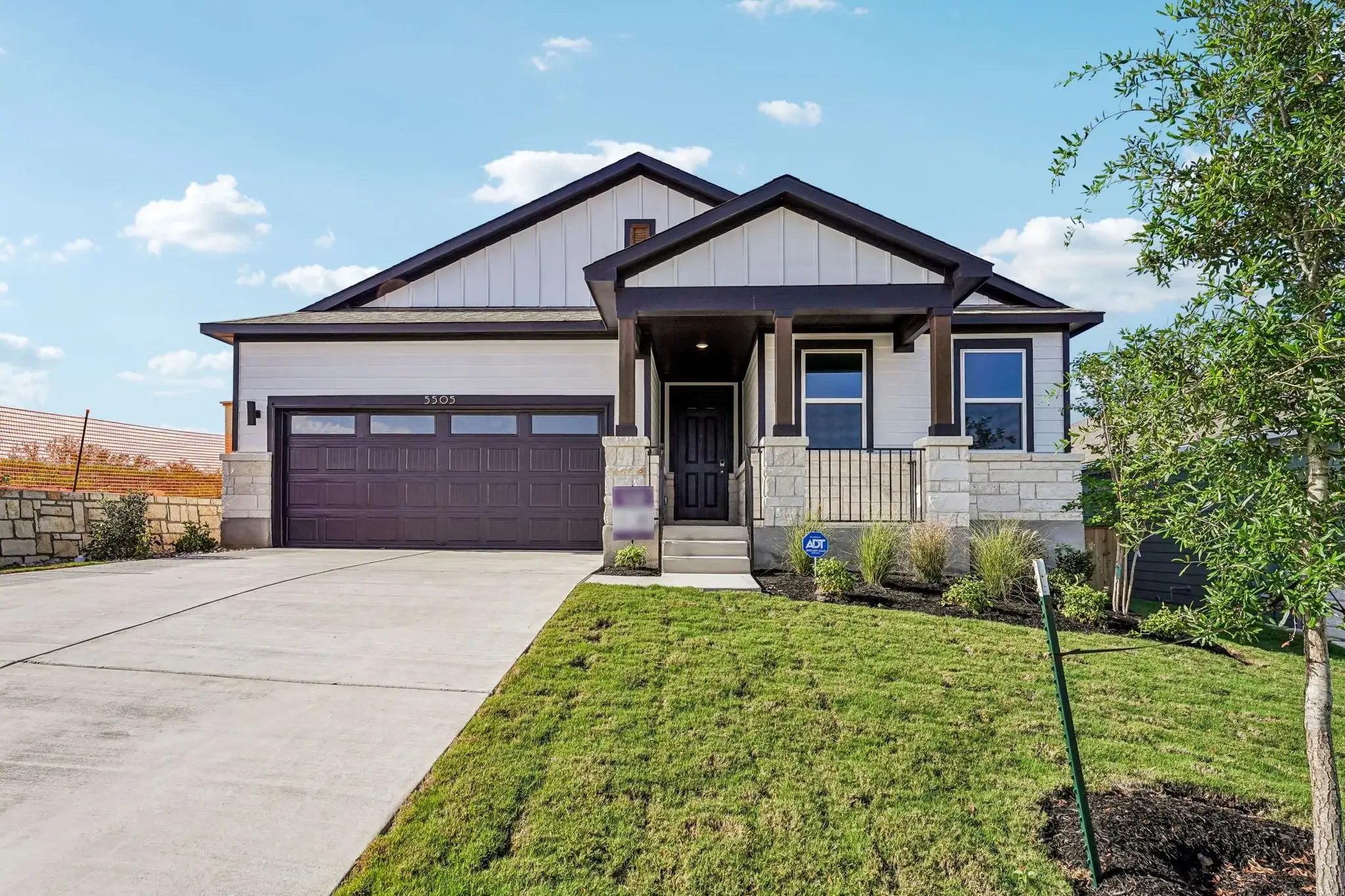 Front exterior of a new home in Cloverleaf, Austin, TX, highlighting curb appeal (Image 1). Front exterior of a new home in Cloverleaf, Austin, TX, highlighting curb appeal (Image 1).