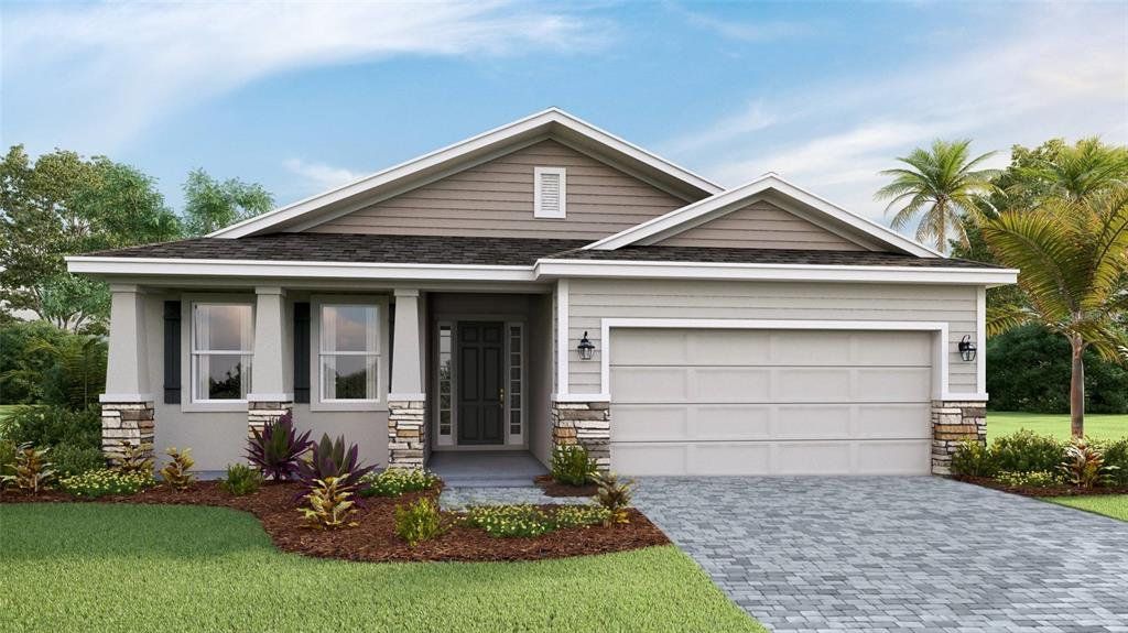 Front exterior of a new home in Star Farms at Lakewood Ranch, Lakewood Ranch, FL, highlighting curb appeal (Image 1). Front exterior of a new home in Star Farms at Lakewood Ranch, Lakewood Ranch, FL, highlighting curb appeal (Image 1).