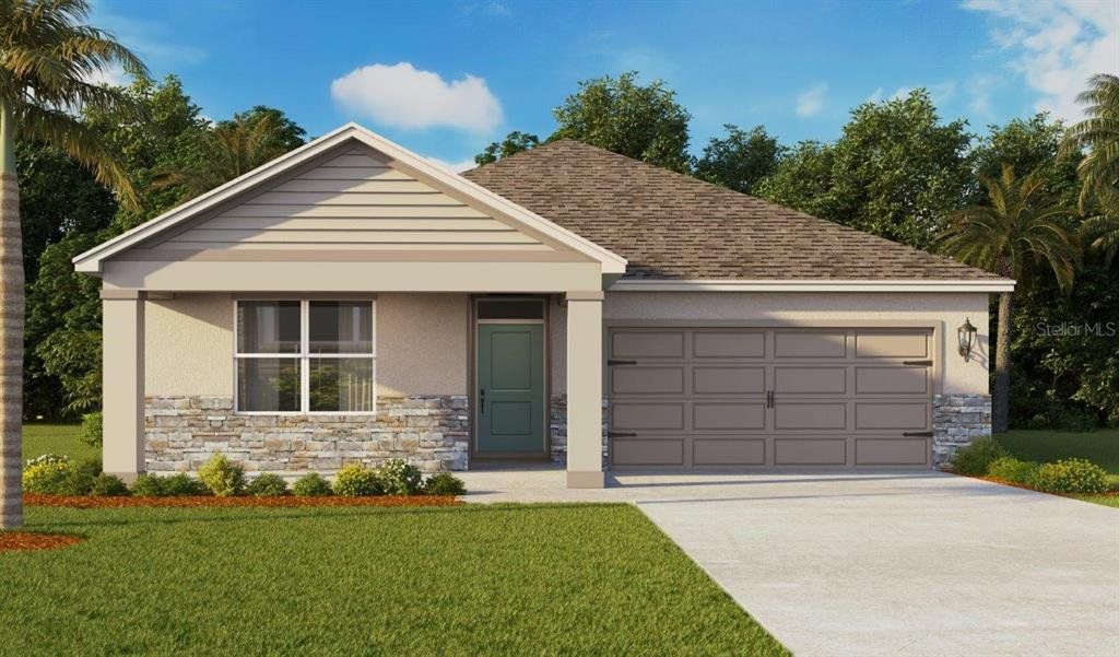 Front exterior of a new home in Summerlin at Hawthorne Ranch, Lakeland, FL, highlighting curb appeal (Image 1). Front exterior of a new home in Summerlin at Hawthorne Ranch, Lakeland, FL, highlighting curb appeal (Image 1).