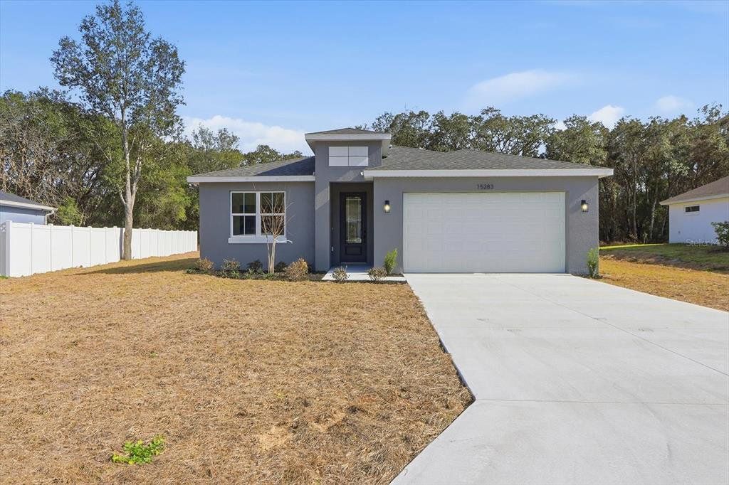 Front exterior of a new home in , Ocala, FL, highlighting curb appeal (Image 1). Front exterior of a new home in , Ocala, FL, highlighting curb appeal (Image 1).