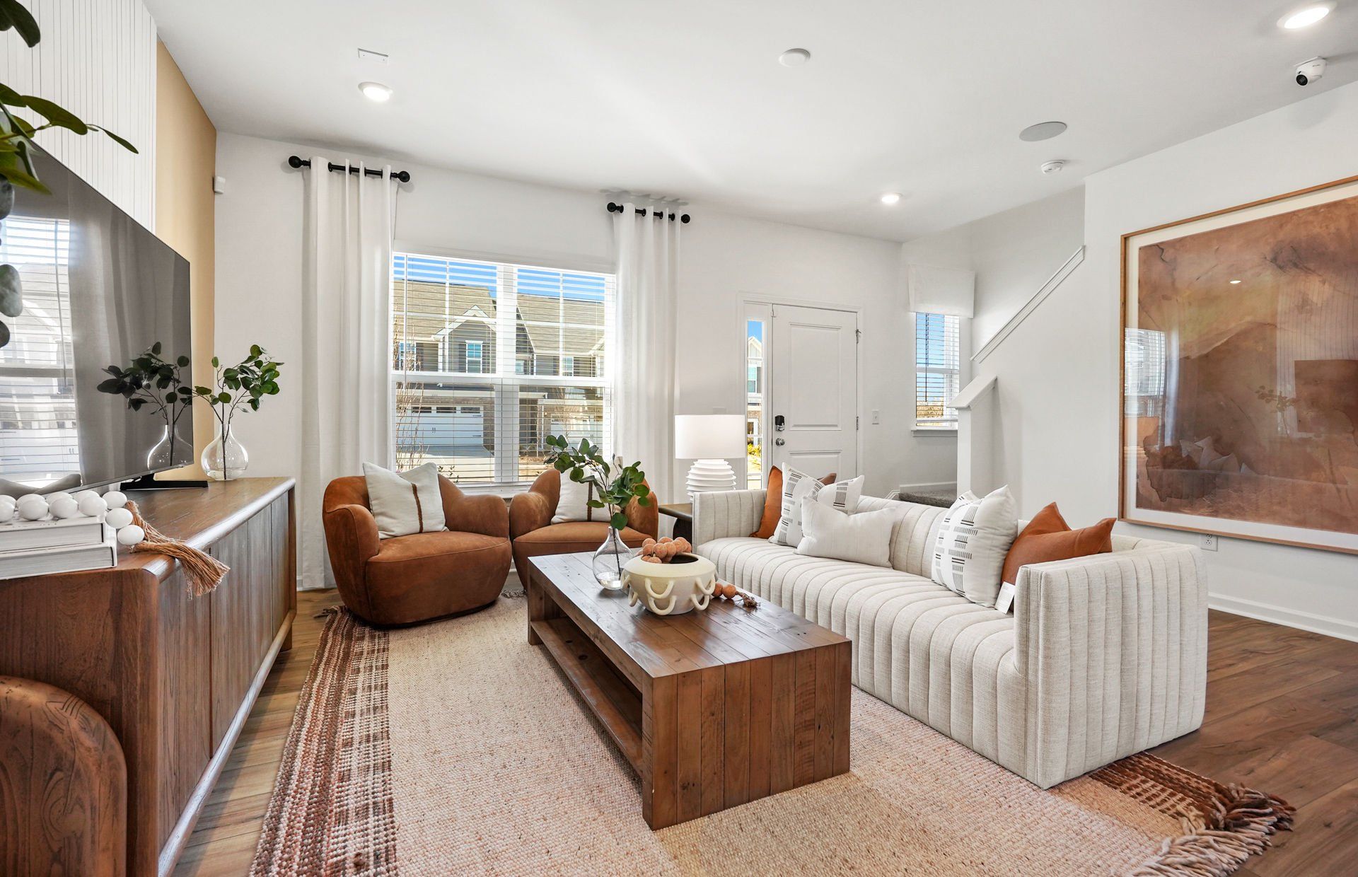 Furnished interior view inside a new home in Riverstone, Monroe (Image 1).