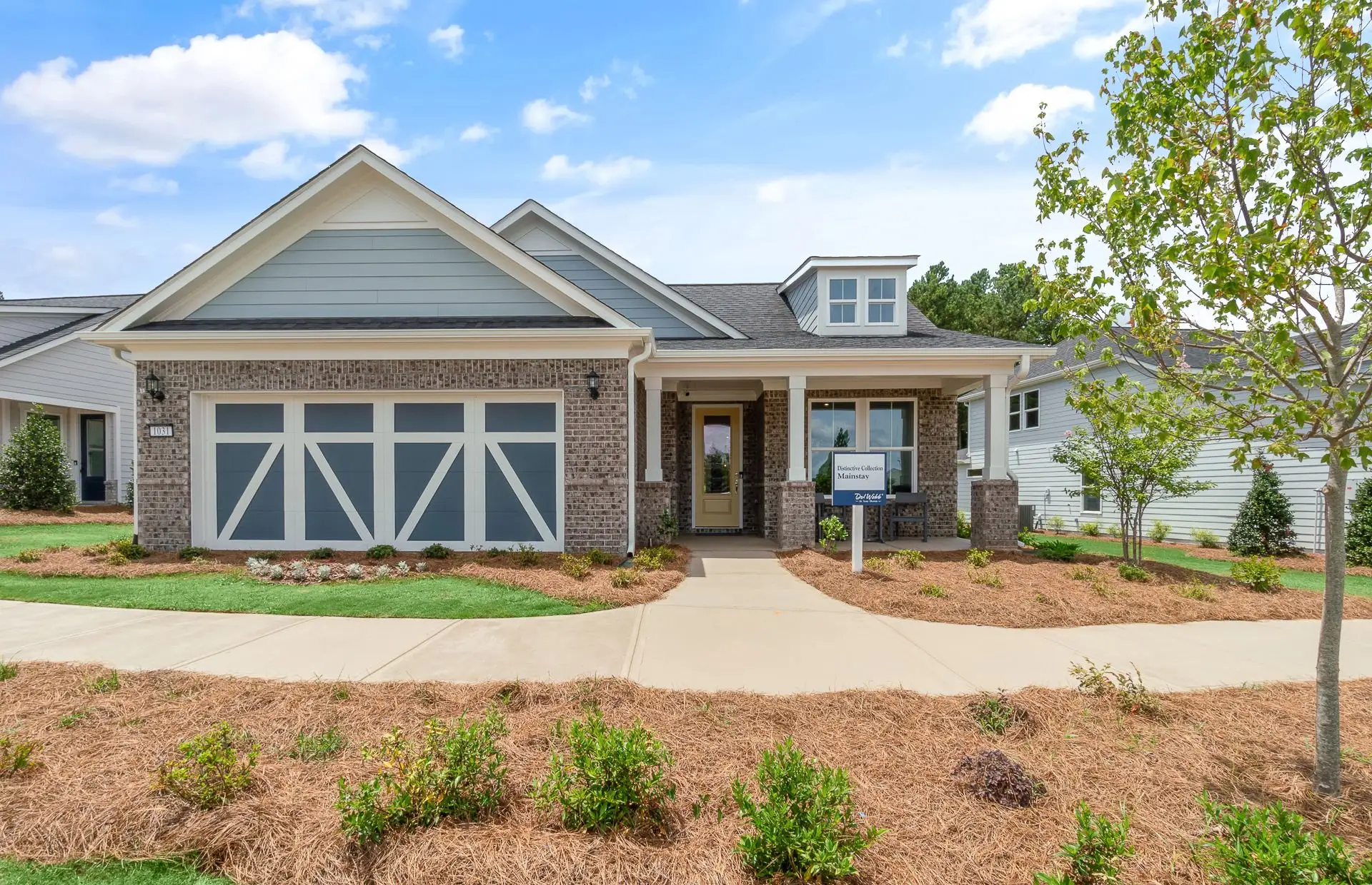 Front exterior of a new home in Del Webb at Lake Oconee, Greensboro, GA, highlighting curb appeal (Image 1). Front exterior of a new home in Del Webb at Lake Oconee, Greensboro, GA, highlighting curb appeal (Image 1).