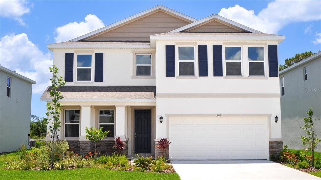 Front exterior of a new home in Coddington, Bradenton, FL, highlighting curb appeal (Image 1).