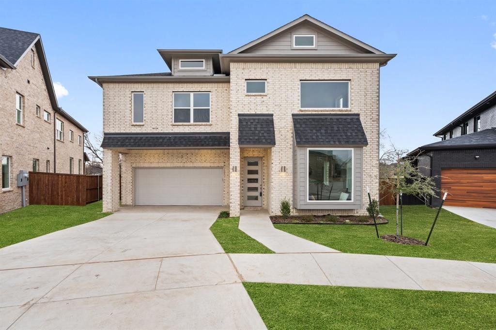 Front exterior of a new home in , Garland, TX, highlighting curb appeal (Image 1). Front exterior of a new home in , Garland, TX, highlighting curb appeal (Image 1).