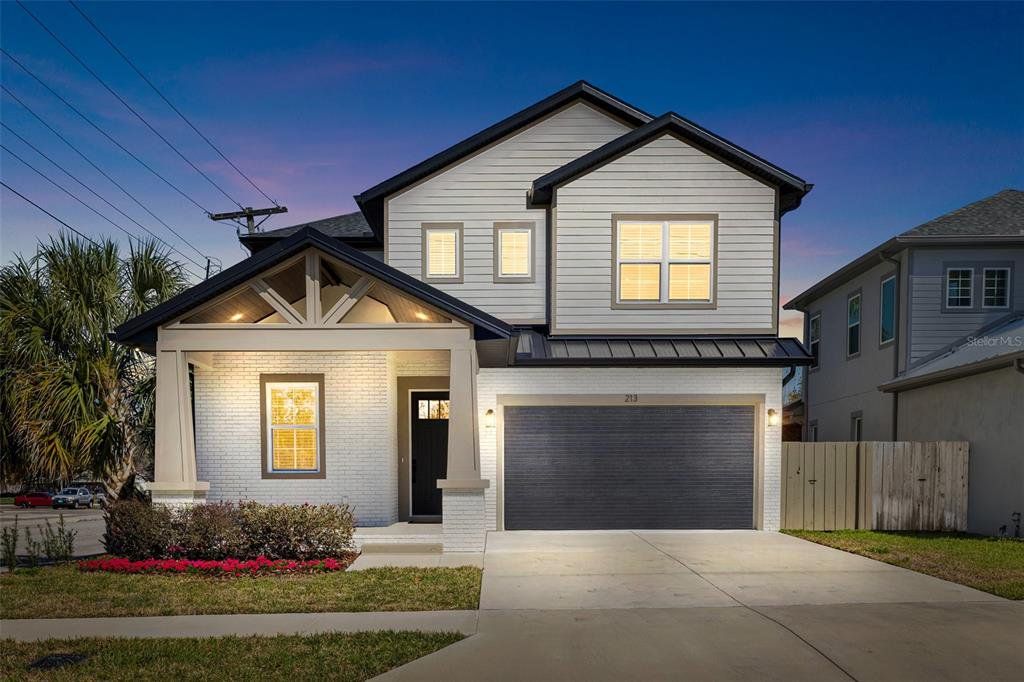 Front exterior of a new home in , Tampa, FL, highlighting curb appeal (Image 1). Front exterior of a new home in , Tampa, FL, highlighting curb appeal (Image 1).