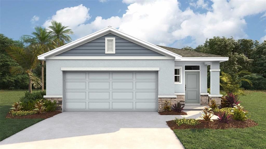 Front exterior of a new home in Northwater at Two Rivers, Zephyrhills, FL, highlighting curb appeal (Image 1). Front exterior of a new home in Northwater at Two Rivers, Zephyrhills, FL, highlighting curb appeal (Image 1).
