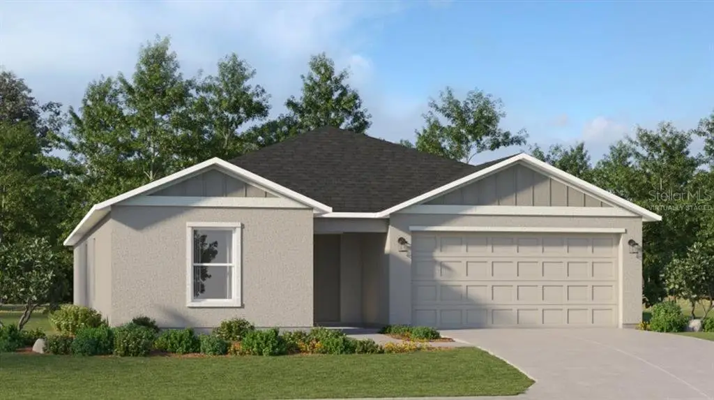 Front exterior of a new home in , Eagle Lake, FL, highlighting curb appeal (Image 1).