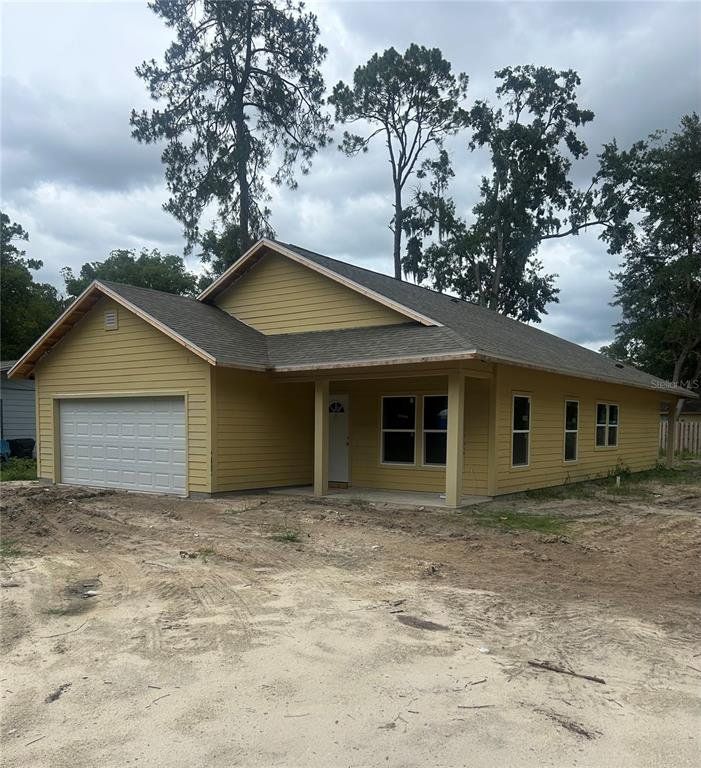 Front exterior of a new home in , Gainesville, FL, highlighting curb appeal (Image 1). Front exterior of a new home in , Gainesville, FL, highlighting curb appeal (Image 1).