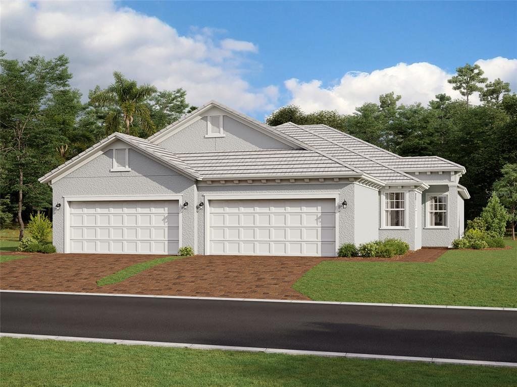 Front exterior of a new home in Sweetwater at Lakewood Ranch, Lakewood Ranch, FL, highlighting curb appeal (Image 1). Front exterior of a new home in Sweetwater at Lakewood Ranch, Lakewood Ranch, FL, highlighting curb appeal (Image 1).