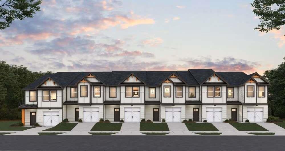 Front exterior of a new home in The Grove At Mundy Mill, Gainesville, GA, highlighting curb appeal (Image 1). Front exterior of a new home in The Grove At Mundy Mill, Gainesville, GA, highlighting curb appeal (Image 1).