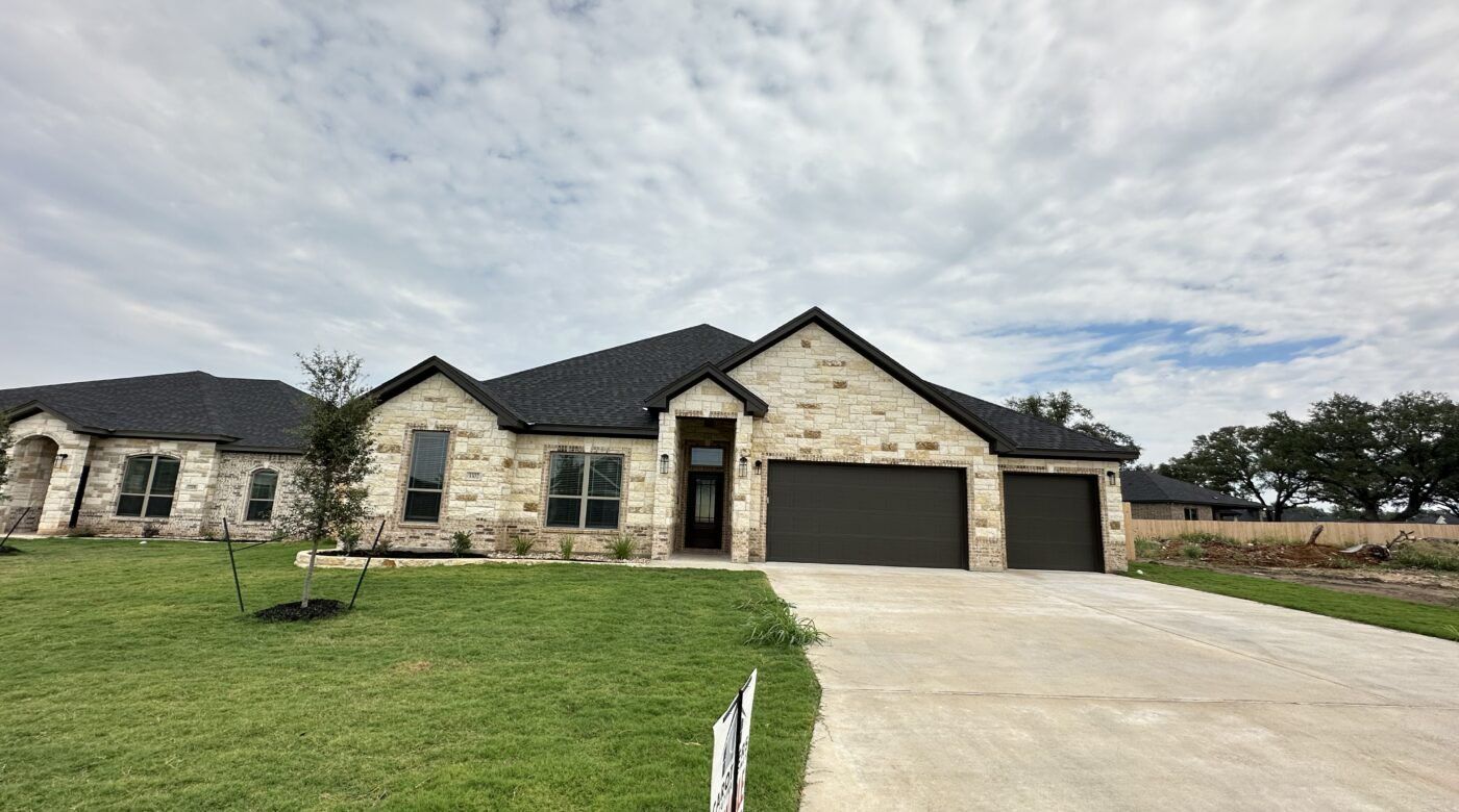 Representative exterior photo of a completed home built from the Aria Bonus 3 Car by Carothers Executive Homes in Eagle Heights, Salado, TX (Image 1). Representative exterior photo of a completed home built from the Aria Bonus 3 Car by Carothers Executive Homes in Eagle Heights, Salado, TX (Image 1).