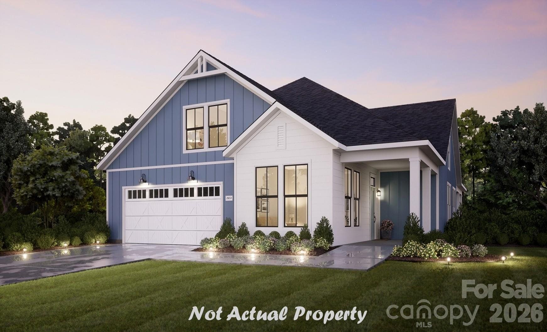 Front exterior of a new home in The Courtyards at Lake Davidson, Mooresville, NC, highlighting curb appeal (Image 1). Front exterior of a new home in The Courtyards at Lake Davidson, Mooresville, NC, highlighting curb appeal (Image 1).