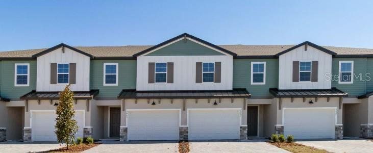 Front exterior of a new home in Magnolia Reserve, Ocoee, FL, highlighting curb appeal (Image 1). Front exterior of a new home in Magnolia Reserve, Ocoee, FL, highlighting curb appeal (Image 1).