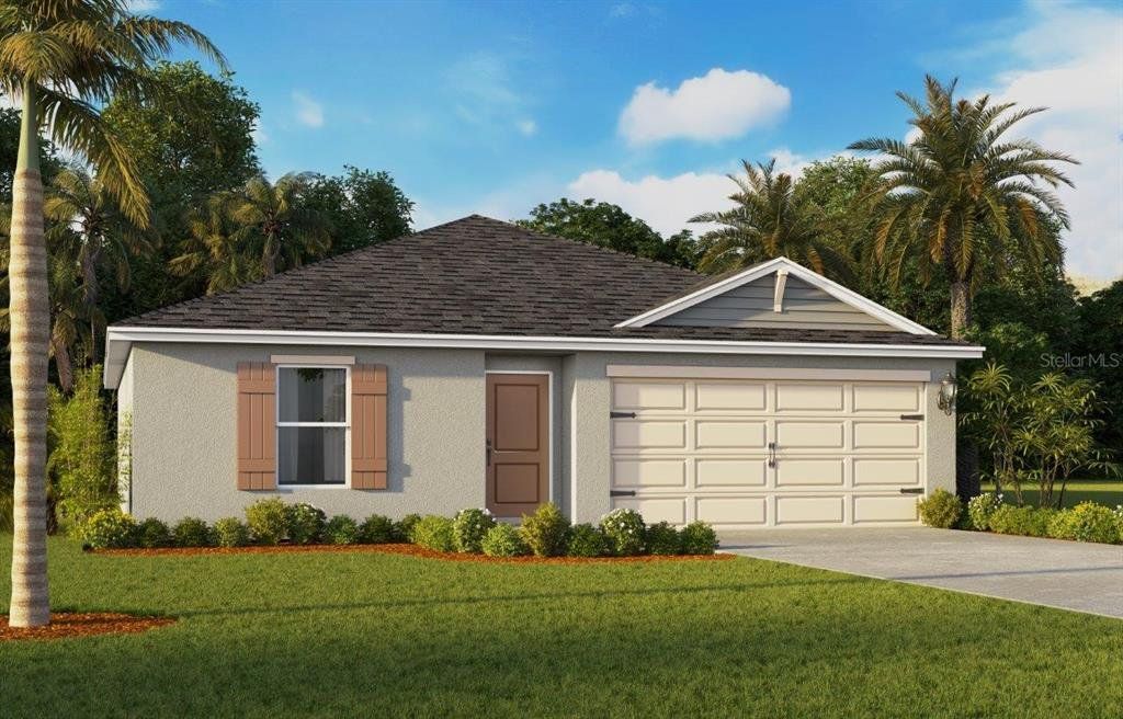 Front exterior of a new home in Magnolia Pointe, Umatilla, FL, highlighting curb appeal (Image 1). Front exterior of a new home in Magnolia Pointe, Umatilla, FL, highlighting curb appeal (Image 1).