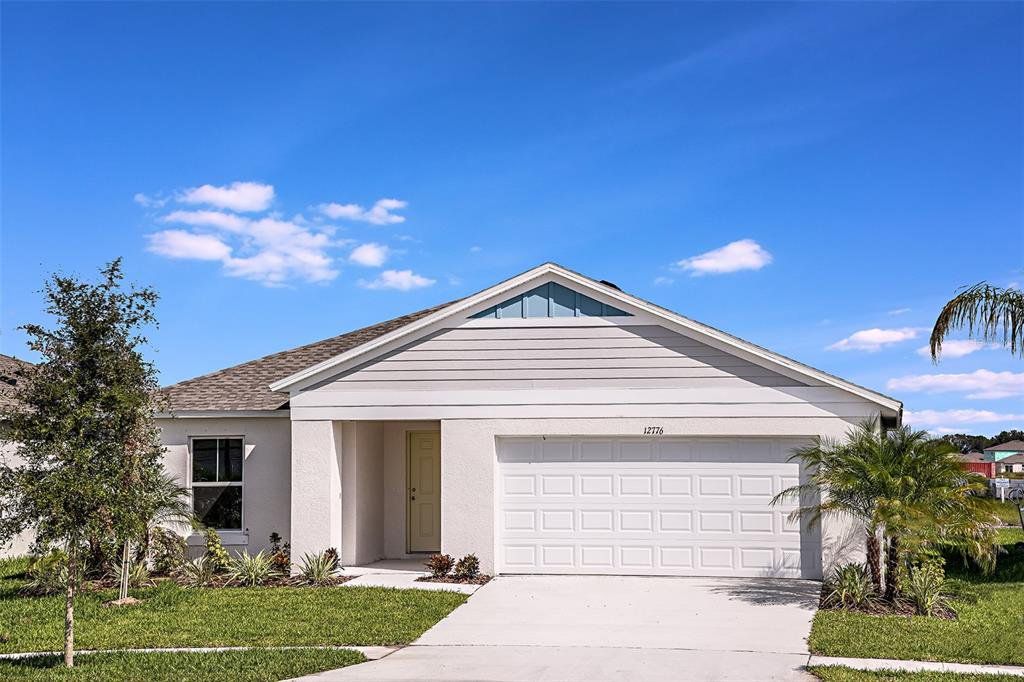 Front exterior of a new home in Lawson Dunes, Haines City, FL, highlighting curb appeal (Image 1). Front exterior of a new home in Lawson Dunes, Haines City, FL, highlighting curb appeal (Image 1).
