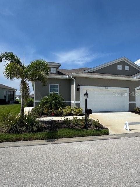 Front exterior of a new home in , Port Charlotte, FL, highlighting curb appeal (Image 1). Front exterior of a new home in , Port Charlotte, FL, highlighting curb appeal (Image 1).