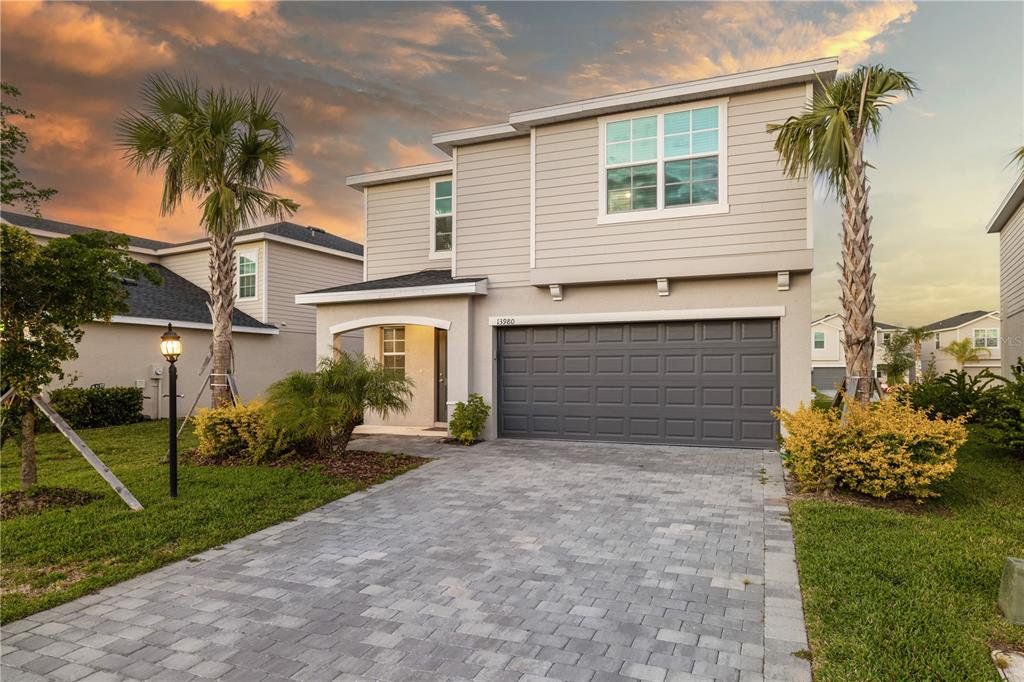 Front exterior of a new home in , Bradenton, FL, highlighting curb appeal (Image 1). Front exterior of a new home in , Bradenton, FL, highlighting curb appeal (Image 1).