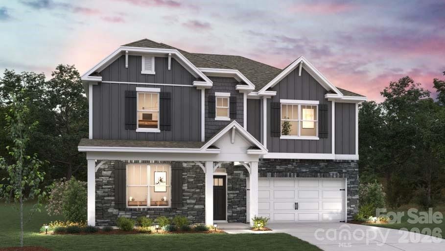 Front exterior of a new home in Westport, York, SC, highlighting curb appeal (Image 1). Front exterior of a new home in Westport, York, SC, highlighting curb appeal (Image 1).