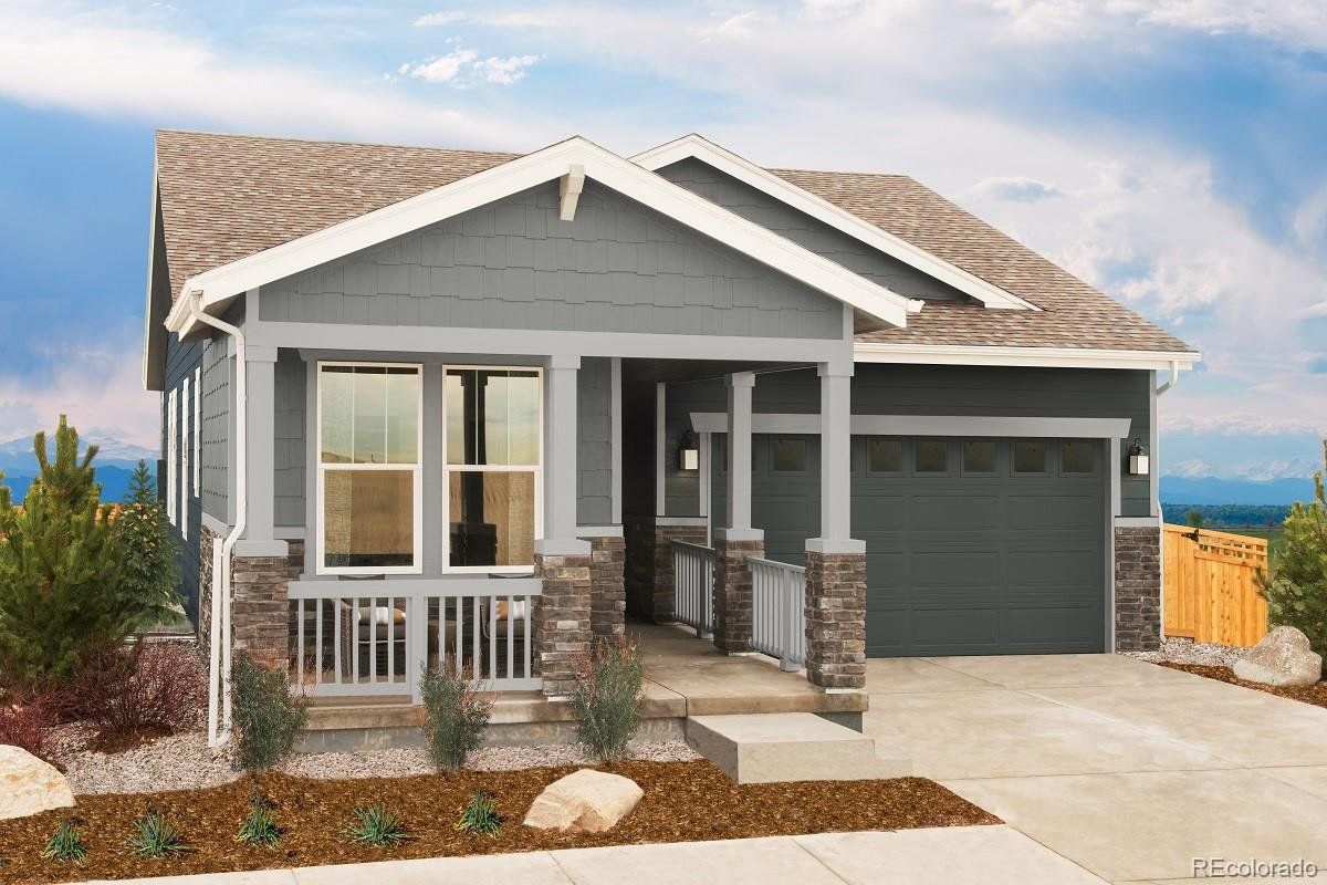 Front exterior of a new home in Painted Prairie, Aurora, CO, highlighting curb appeal (Image 1).