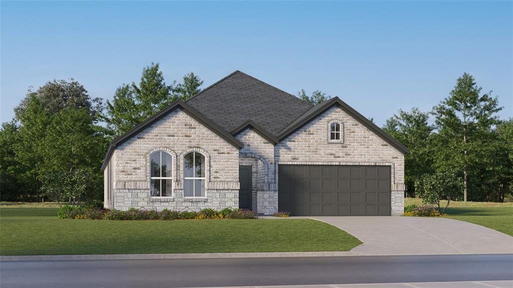 French provincial home featuring a front lawn, driveway, stone siding, and brick siding French provincial home featuring a front lawn, driveway, stone siding, and brick siding