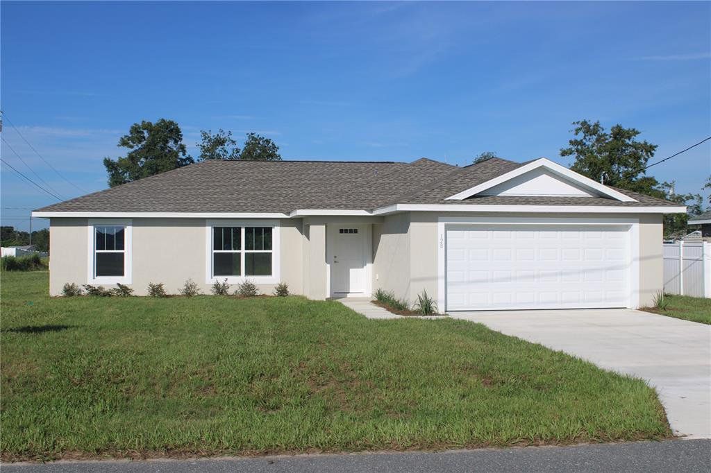 Front exterior of a new home in , Ocala, FL, highlighting curb appeal (Image 1). Front exterior of a new home in , Ocala, FL, highlighting curb appeal (Image 1).