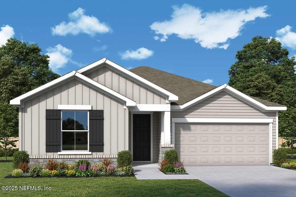 Front exterior of a new home in Tributary 50', Yulee, FL, highlighting curb appeal (Image 1).
