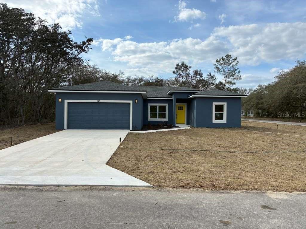 Front exterior of a new home in , Ocklawaha, FL, highlighting curb appeal (Image 1). Front exterior of a new home in , Ocklawaha, FL, highlighting curb appeal (Image 1).