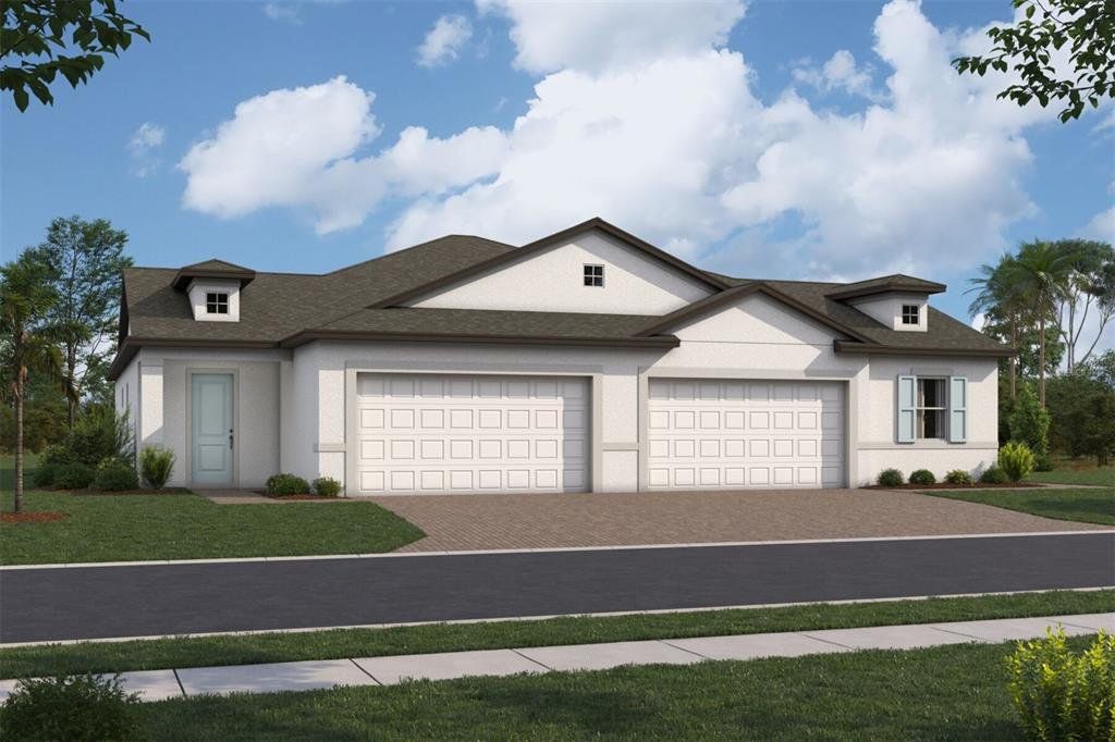 Front exterior of a new home in Kings Gate, Port Charlotte, FL, highlighting curb appeal (Image 1). Front exterior of a new home in Kings Gate, Port Charlotte, FL, highlighting curb appeal (Image 1).