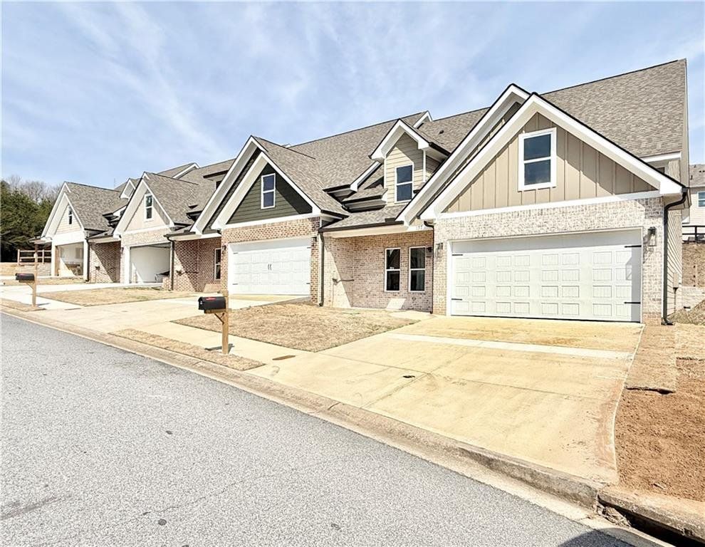 Front exterior of a new home in , Dahlonega, GA, highlighting curb appeal (Image 1). Front exterior of a new home in , Dahlonega, GA, highlighting curb appeal (Image 1).