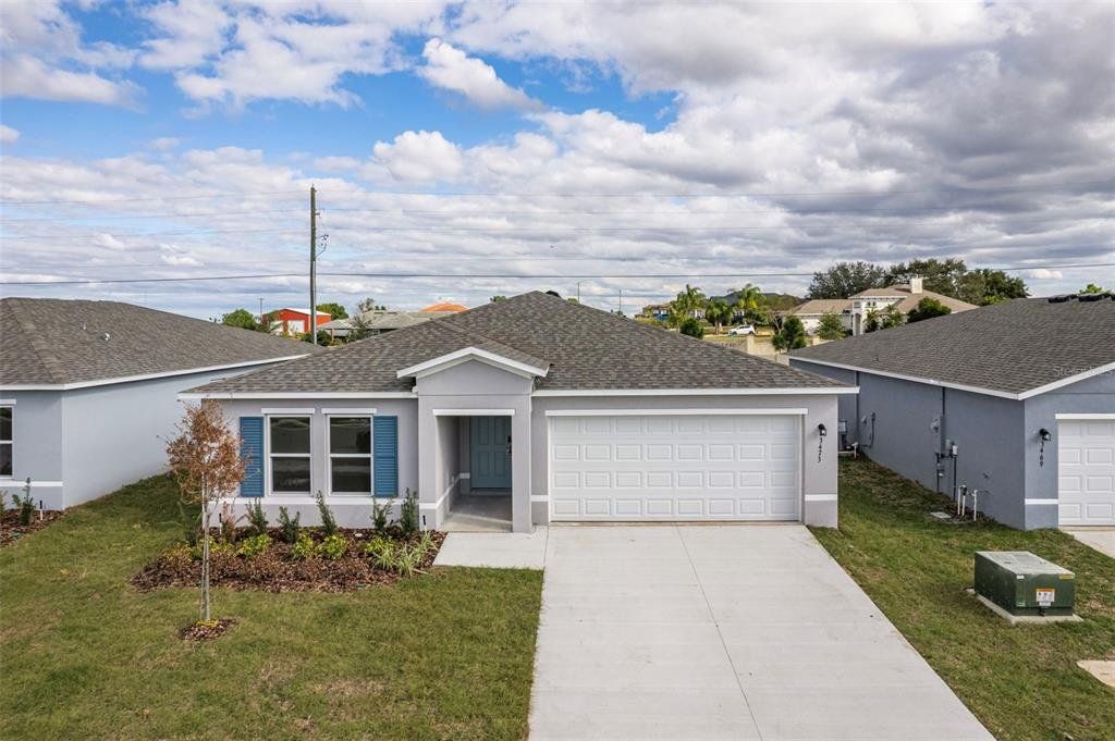 Front exterior of a new home in Scenic Terrace, Lake Hamilton, FL, highlighting curb appeal (Image 1). Front exterior of a new home in Scenic Terrace, Lake Hamilton, FL, highlighting curb appeal (Image 1).