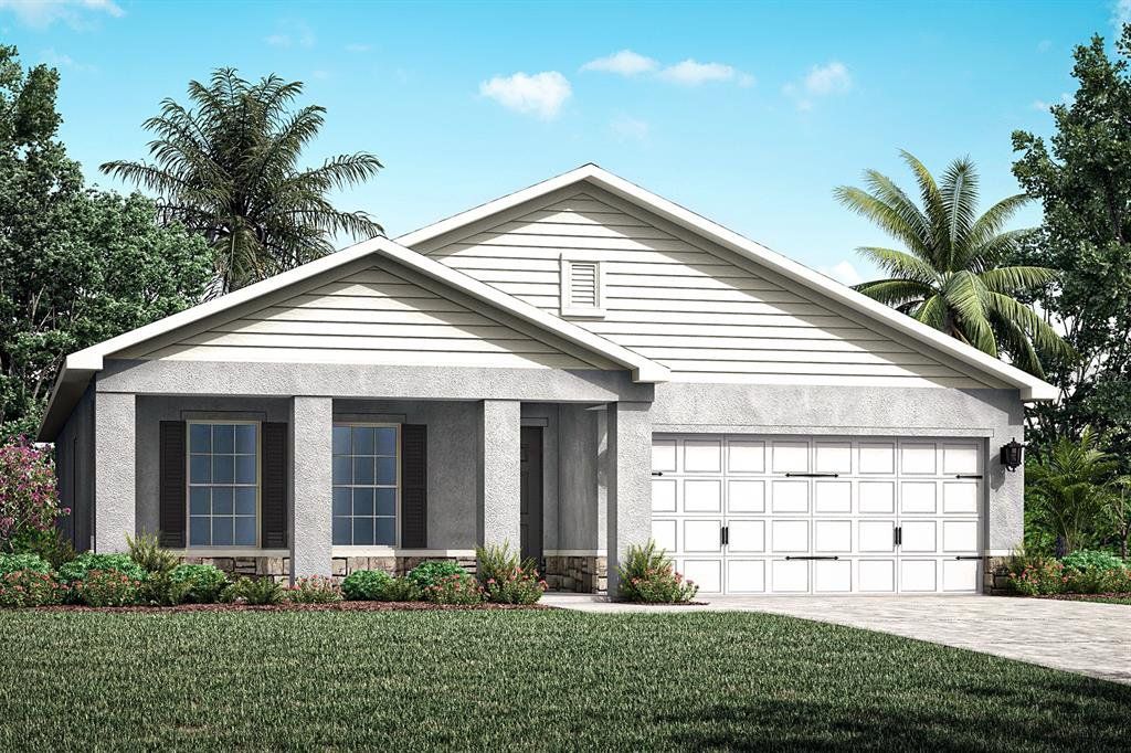 Front exterior of a new home in Hillwood Preserve, Bradenton, FL, highlighting curb appeal (Image 1). Front exterior of a new home in Hillwood Preserve, Bradenton, FL, highlighting curb appeal (Image 1).
