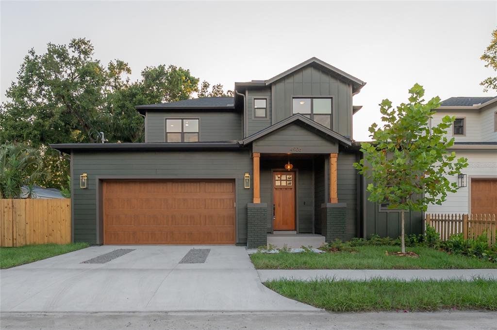 Front exterior of a new home in , Tampa, FL, highlighting curb appeal (Image 1).