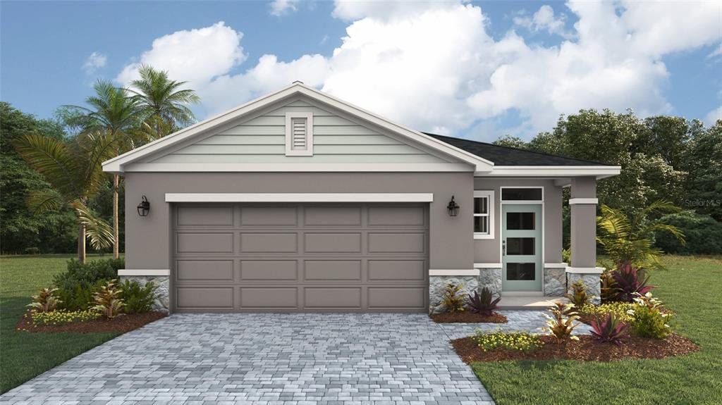 Front exterior of a new home in Legacy Preserve, Parrish, FL, highlighting curb appeal (Image 1). Front exterior of a new home in Legacy Preserve, Parrish, FL, highlighting curb appeal (Image 1).
