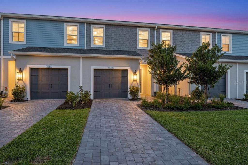 Front exterior of a new home in , Bradenton, FL, highlighting curb appeal (Image 1). Front exterior of a new home in , Bradenton, FL, highlighting curb appeal (Image 1).