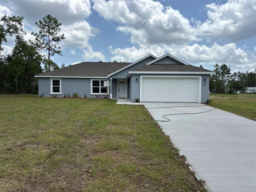 Front exterior of a new home in , Dunnellon, FL, highlighting curb appeal (Image 1). Front exterior of a new home in , Dunnellon, FL, highlighting curb appeal (Image 1).