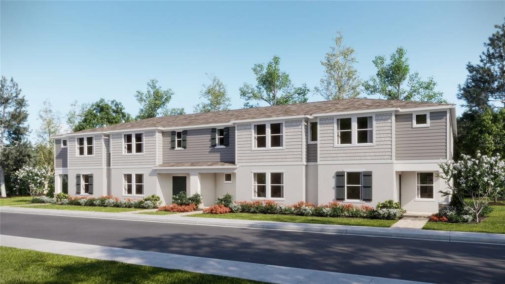Front exterior of a new home in The Glades at Crossprairie, St. Cloud, FL, highlighting curb appeal (Image 1). Front exterior of a new home in The Glades at Crossprairie, St. Cloud, FL, highlighting curb appeal (Image 1).