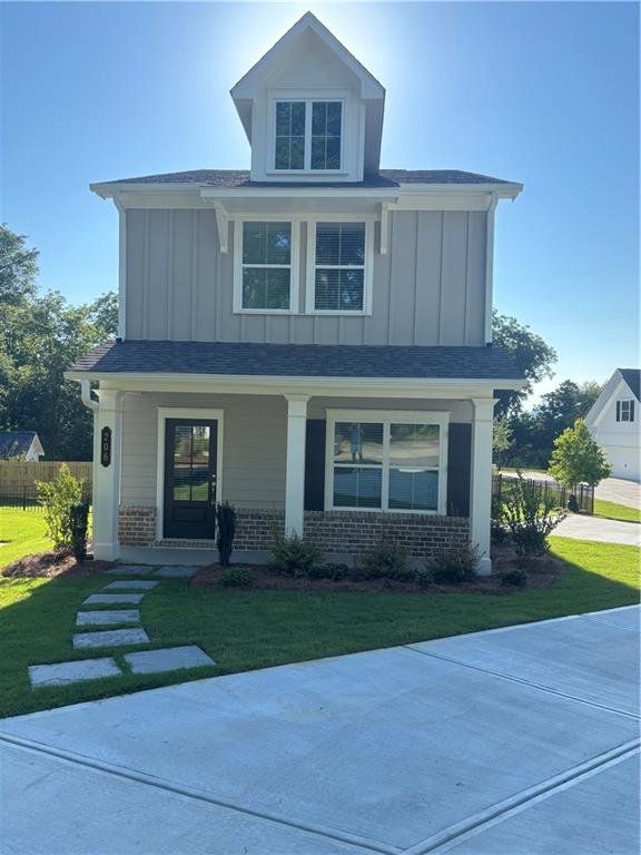 Front exterior of a new home in , Marietta, GA, highlighting curb appeal (Image 1). Front exterior of a new home in , Marietta, GA, highlighting curb appeal (Image 1).