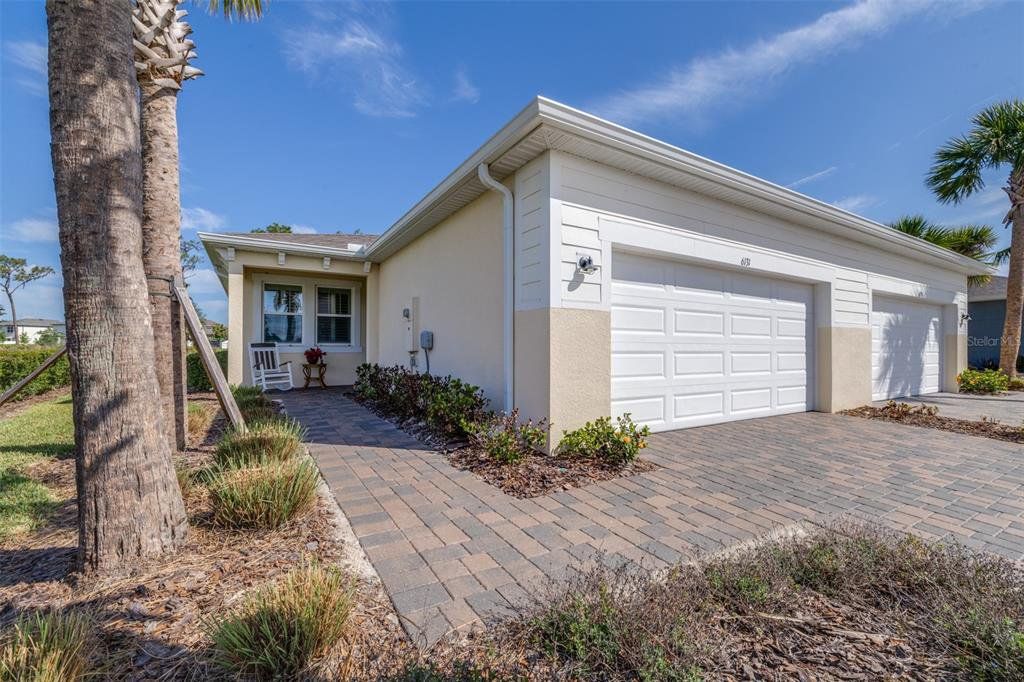 Front exterior of a new home in , Wesley Chapel, FL, highlighting curb appeal (Image 1). Front exterior of a new home in , Wesley Chapel, FL, highlighting curb appeal (Image 1).