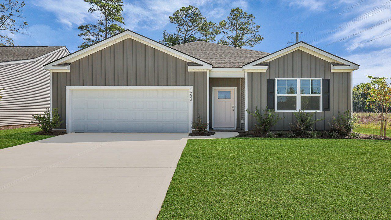 Front exterior of a new home in Pineview North, Summerville, SC, highlighting curb appeal (Image 1). Front exterior of a new home in Pineview North, Summerville, SC, highlighting curb appeal (Image 1).