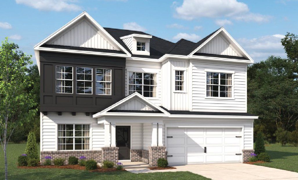 Front exterior of a new home in The Point, Rolesville, NC, highlighting curb appeal (Image 1). Front exterior of a new home in The Point, Rolesville, NC, highlighting curb appeal (Image 1).