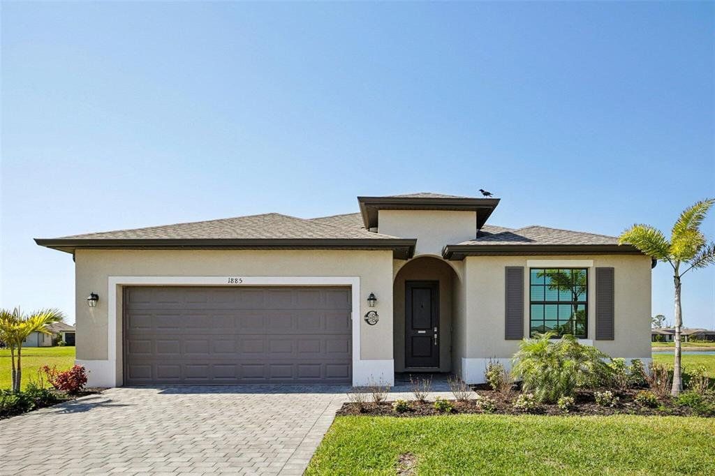 Front exterior of a new home in , Port Charlotte, FL, highlighting curb appeal (Image 1). Front exterior of a new home in , Port Charlotte, FL, highlighting curb appeal (Image 1).
