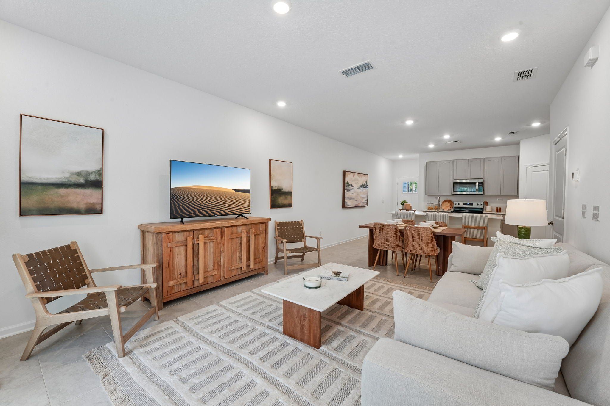Furnished interior view inside a new home in Atlantis Pointe, Middleburg (Image 1). Furnished interior view inside a new home in Atlantis Pointe, Middleburg (Image 1).