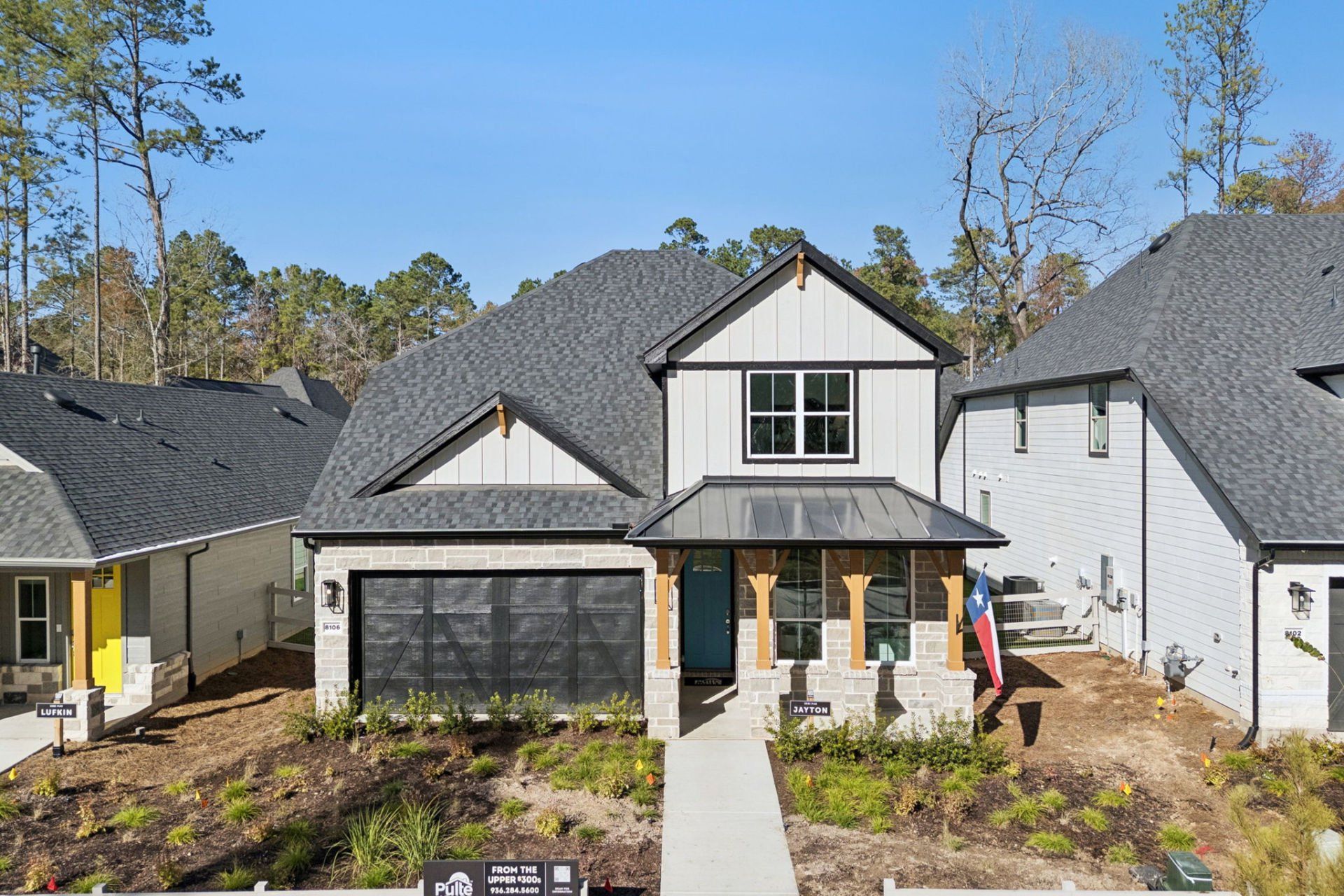 Front exterior of a new home in Pulte Homes at Two Step Farm, Montgomery, TX, highlighting curb appeal (Image 1). Front exterior of a new home in Pulte Homes at Two Step Farm, Montgomery, TX, highlighting curb appeal (Image 1).