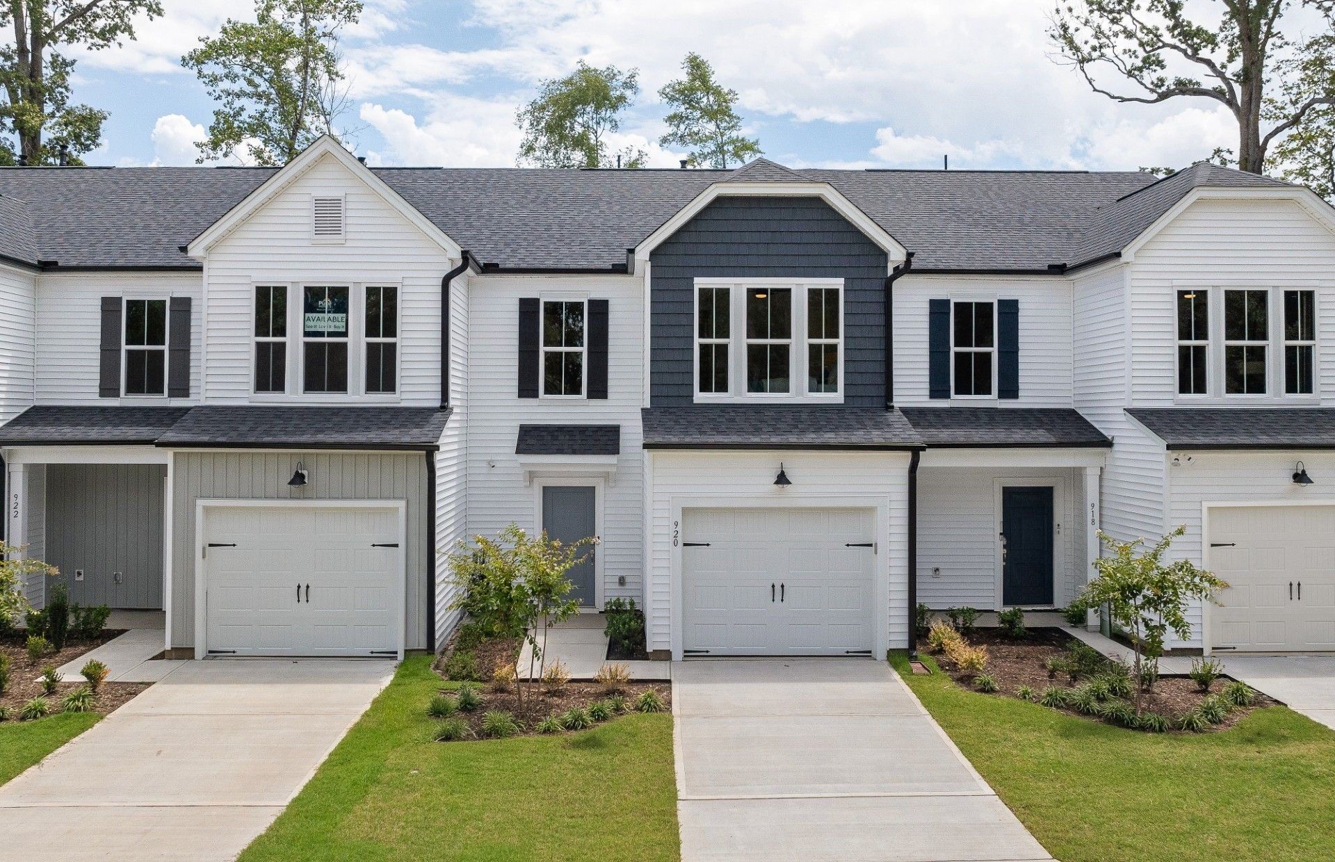 Front exterior of a new home in Poets Walk, Whitsett, NC, highlighting curb appeal (Image 1). Front exterior of a new home in Poets Walk, Whitsett, NC, highlighting curb appeal (Image 1).