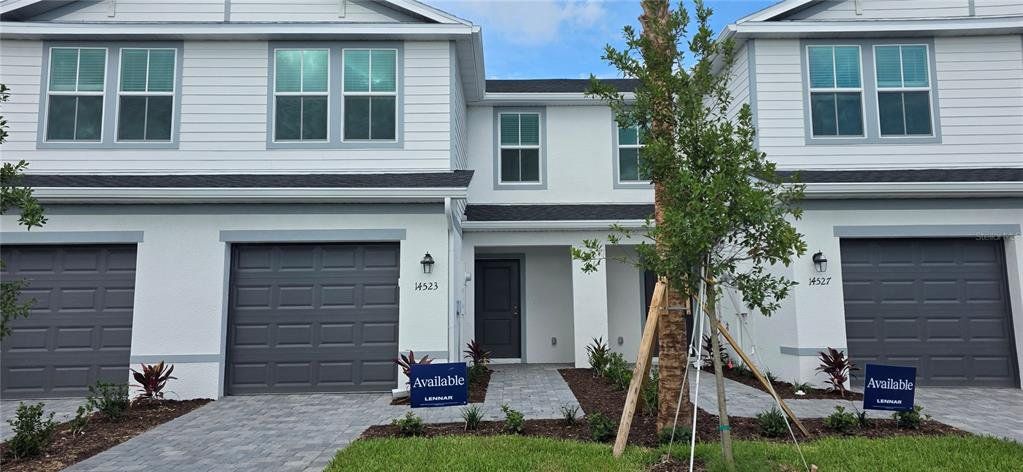 Front exterior of a new home in , Bradenton, FL, highlighting curb appeal (Image 1). Front exterior of a new home in , Bradenton, FL, highlighting curb appeal (Image 1).