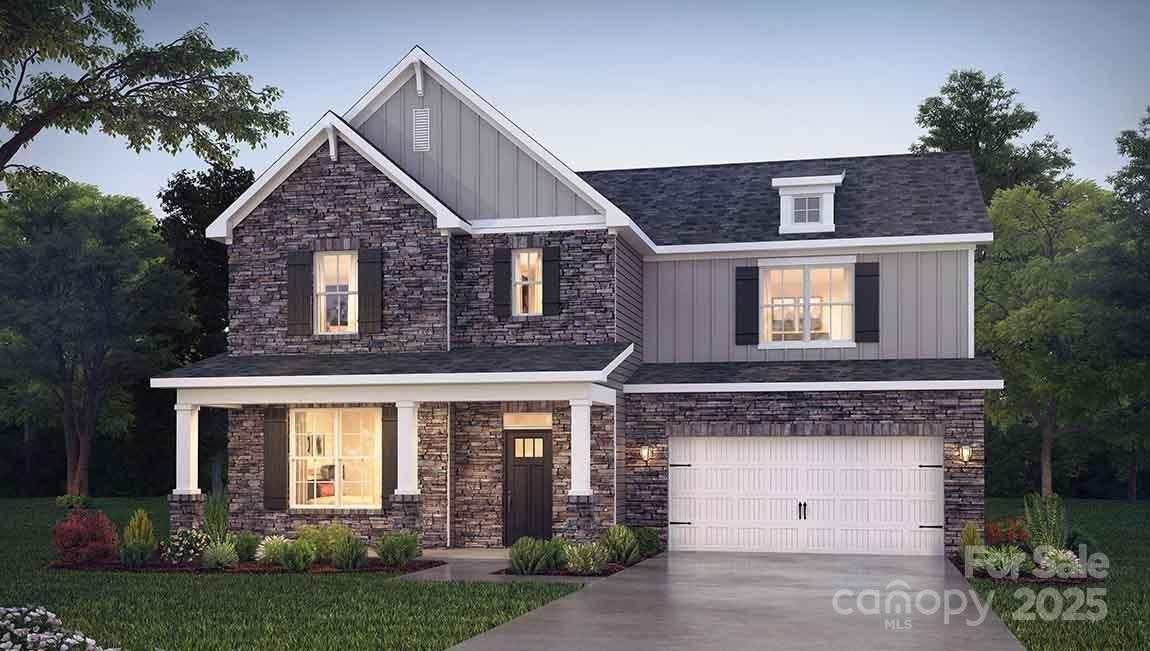 Front exterior of a new home in Westport, York, SC, highlighting curb appeal (Image 1). Front exterior of a new home in Westport, York, SC, highlighting curb appeal (Image 1).