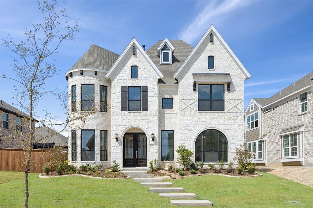 Front exterior of a new home in Trails at Cottonwood Creek, Wylie, TX, highlighting curb appeal (Image 1). Front exterior of a new home in Trails at Cottonwood Creek, Wylie, TX, highlighting curb appeal (Image 1).